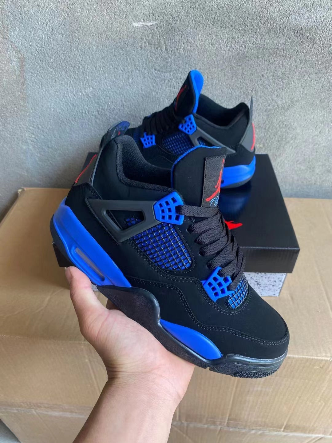 Air Jordan 4 Blue and Red Sneakers